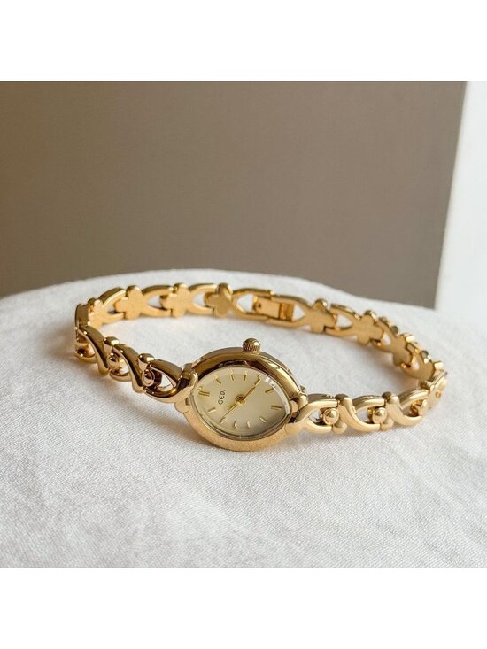 Womens Gold Analog Quartz Alloy Steel Oval Roman Numeral Number Bracelet Watch
